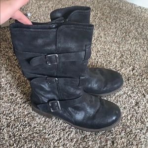 Black combat boots with buckles